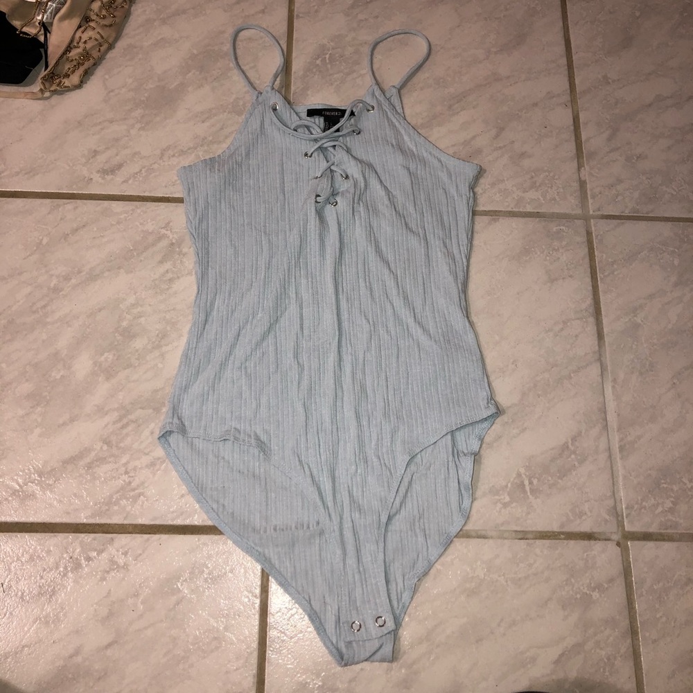 Light blue body suit, tags attached